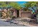 Charming single-story home with a well-manicured lawn and desert landscaping at 3055 N Red Mtn # 122, Mesa, AZ 85207