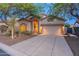 Inviting single-story home featuring a 2-car garage, desert landscaping, and charming curb appeal at 3055 N Red Mtn # 122, Mesa, AZ 85207