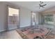 Living room with vaulted ceilings, ceiling fan and ceramic tile floors at 3055 N Red Mtn # 122, Mesa, AZ 85207