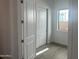 Bedroom showcasing closet and bright window, offering a modern aesthetic at 3637 E Rochelle Cir, Mesa, AZ 85213