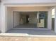A covered patio with large sliding glass doors leads to an open-concept living space at 3637 E Rochelle Cir, Mesa, AZ 85213