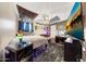 Eclectic bedroom with a funky ceiling, a large TV, personal touches, and a playful atmosphere at 41143 W Rio Bravo Dr, Maricopa, AZ 85138