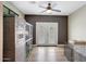 Versatile living room offering an abundance of natural light and direct access to the backyard at 41143 W Rio Bravo Dr, Maricopa, AZ 85138