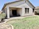 Backyard features an outdoor patio and well-maintained green space at 4117 W Allen St, Laveen, AZ 85339