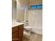 Well-maintained bathroom featuring a tiled tub and sink at 4117 W Allen St, Laveen, AZ 85339