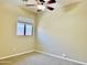 Clean bedroom featuring neutral colors, carpet, and natural light at 4117 W Allen St, Laveen, AZ 85339