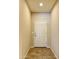 Inviting entryway featuring a white front door and neutral-toned walls at 4117 W Allen St, Laveen, AZ 85339