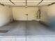 Clean, spacious garage with an operational door at 4117 W Allen St, Laveen, AZ 85339