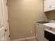 Laundry room with white appliances at 4117 W Allen St, Laveen, AZ 85339