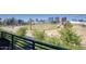 Scenic balcony view of lush greenery and city buildings at 475 N 9Th St # 303, Phoenix, AZ 85006