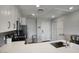 Bright kitchen with stainless appliances, white cabinets, and a large countertop at 475 N 9Th St # 303, Phoenix, AZ 85006