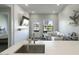 Stylish living room with modern decor, a white sectional, and a walk-out patio at 475 N 9Th St # 303, Phoenix, AZ 85006