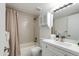 Bright bathroom featuring a shower-tub combo and a vanity with modern fixtures at 4932 E Kathleen Rd, Scottsdale, AZ 85254