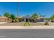 Beautiful home with solar panels, a manicured lawn, and attractive landscaping at 4932 E Kathleen Rd, Scottsdale, AZ 85254