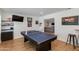 Bright game room featuring a ping pong table and access to the cozy living area at 4932 E Kathleen Rd, Scottsdale, AZ 85254
