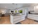 Open kitchen overlooking the living room and dining area, featuring a large island with bar seating at 4932 E Kathleen Rd, Scottsdale, AZ 85254