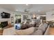 Comfortable living room with a fireplace and an open floor plan at 4932 E Kathleen Rd, Scottsdale, AZ 85254