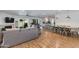 Spacious open-concept living area with fireplace, dining and kitchen beyond at 4932 E Kathleen Rd, Scottsdale, AZ 85254