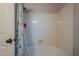 Clean bathroom with a shower and a patterned curtain, providing a functional and tidy space at 5952 E Phelps Rd, Scottsdale, AZ 85254