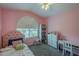 Bright bedroom with a cozy bed, bright window, and ample storage, perfect for a space at 5952 E Phelps Rd, Scottsdale, AZ 85254