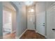 Bright foyer featuring arched doorway and ceramic tile flooring, showcasing open layout at 5952 E Phelps Rd, Scottsdale, AZ 85254