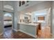 Open-concept kitchen showcasing an island, stainless appliances, and granite countertops at 5952 E Phelps Rd, Scottsdale, AZ 85254