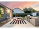 This backyard features a built in grill and table setting making it perfect for entertaining guests at 6746 E Monterosa St, Scottsdale, AZ 85251