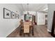 Charming dining room with wood table, woven chairs, and modern decor at 6746 E Monterosa St, Scottsdale, AZ 85251