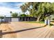 This contemporary home boasts a sleek facade, a spacious driveway, and mature trees for added curb appeal at 6746 E Monterosa St, Scottsdale, AZ 85251