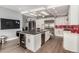 Well-equipped kitchen featuring a large island, built-in wine fridge, and open layout at 6746 E Monterosa St, Scottsdale, AZ 85251