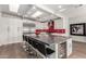 Spacious kitchen with a wine fridge, oversized island, and stainless steel appliances at 6746 E Monterosa St, Scottsdale, AZ 85251