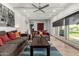 Bright living room with modern furniture, stylish rug, and ample natural light at 6746 E Monterosa St, Scottsdale, AZ 85251