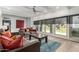 Spacious living room with large windows, comfortable seating, and bright lighting at 6746 E Monterosa St, Scottsdale, AZ 85251