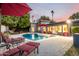 Lounge by the backyard pool and enjoy outdoor relaxation in this fabulous outdoor living space at 6746 E Monterosa St, Scottsdale, AZ 85251