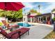 Relaxing backyard pool area featuring a modern design, lounge chairs, and ample patio space at 6746 E Monterosa St, Scottsdale, AZ 85251