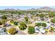 Aerial view of a neighborhood featuring tree-lined streets, well-maintained homes and mountain views at 6819 N 10Th Pl, Phoenix, AZ 85014