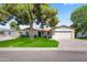 Inviting single-story house with a spacious yard and an attached two-car garage at 6819 N 10Th Pl, Phoenix, AZ 85014