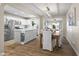 Open layout showcasing an island, stainless appliances, and dining area at 6819 N 10Th Pl, Phoenix, AZ 85014