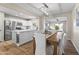 Bright kitchen with an island, stainless steel appliances, and a dining space at 6819 N 10Th Pl, Phoenix, AZ 85014