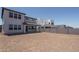 The expansive dirt backyard is fenced, offering plenty of space for future landscaping at 7944 W Griswold Rd, Peoria, AZ 85345