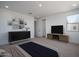 Bedroom featuring a modern dresser and television for relaxation at 7944 W Griswold Rd, Peoria, AZ 85345