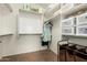 Organized walk-in closet with shelving, hanging rods, and storage containers at 80 W Grey Stone St, San Tan Valley, AZ 85143