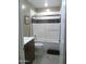 Nicely updated bathroom with a shower over tub and dark wood vanity for a modern look at 8700 E Mountain View Rd # 2029, Scottsdale, AZ 85258