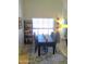Bright dining room with modern table and chairs, complemented by natural light and stylish decor at 8700 E Mountain View Rd # 2029, Scottsdale, AZ 85258