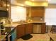 Well-lit kitchen featuring granite countertops, stainless steel appliances, and ample cabinet space at 8700 E Mountain View Rd # 2029, Scottsdale, AZ 85258