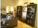 Comfortable living room featuring stylish furniture, built-in bookshelves, and an open design with abundant natural light at 8700 E Mountain View Rd # 2029, Scottsdale, AZ 85258