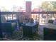 Inviting outdoor patio space with comfortable seating, a glass table, and decorative accents at 8700 E Mountain View Rd # 2029, Scottsdale, AZ 85258