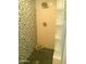 Walk-in shower with modern fixtures, tiled walls, and glass block detail, showcasing a relaxing spa space at 8700 E Mountain View Rd # 2029, Scottsdale, AZ 85258