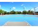 Community blue basketball court with trees and lush landscape at 9115 N 101St Way, Scottsdale, AZ 85258