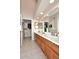 Well-lit bathroom with double sinks, spacious counter, and convenient access to the walk-in closets at 9115 N 101St Way, Scottsdale, AZ 85258